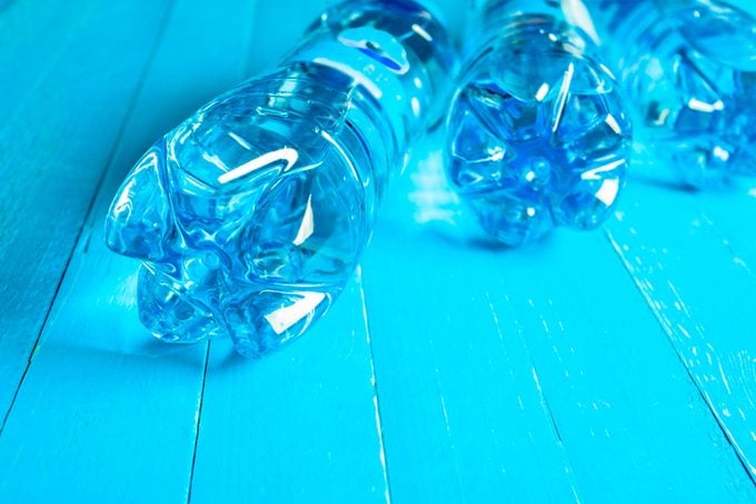 water bottles on their side, blue light