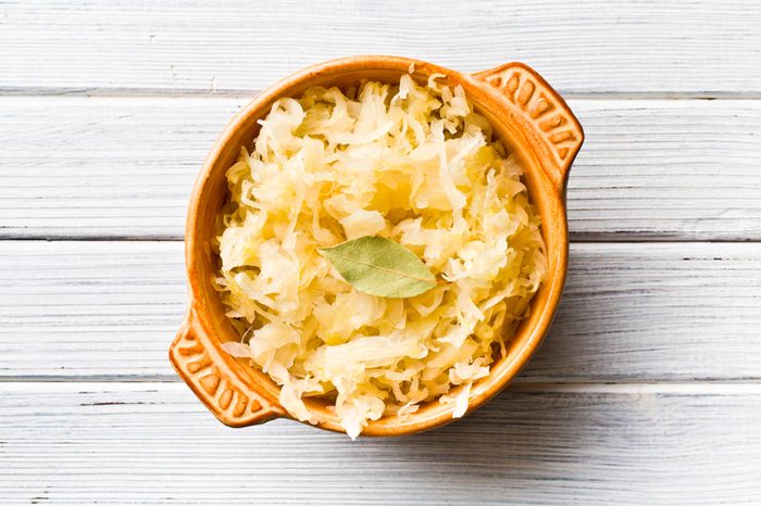 A bowl of sauerkraut.