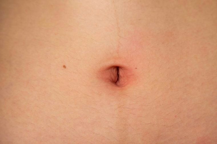 close up of a belly button