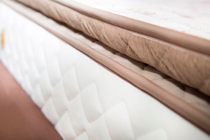 close up of mattress and mattress pad