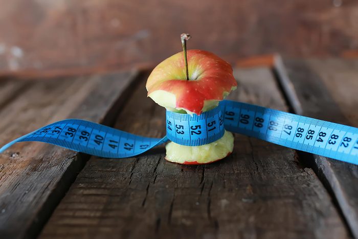 apple core with tape measure