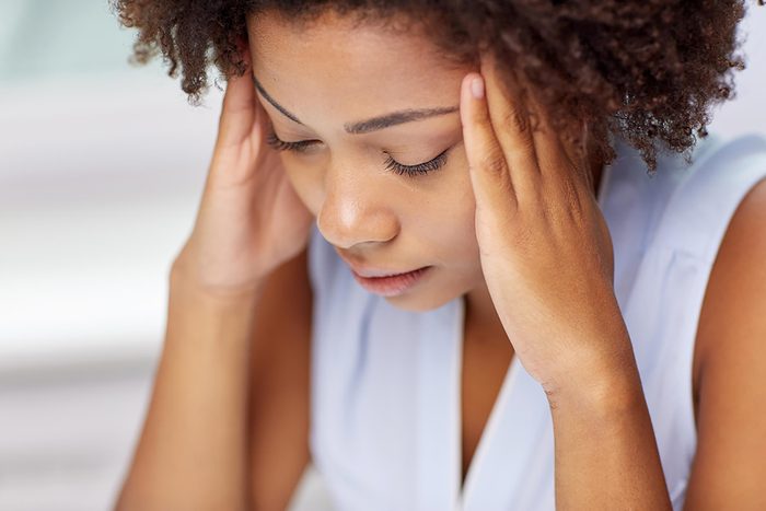 stressed woman with headache