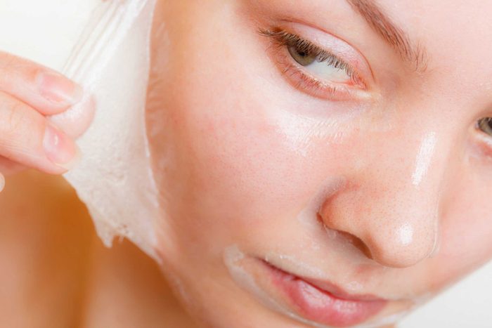 woman getting a chemical peel on her face