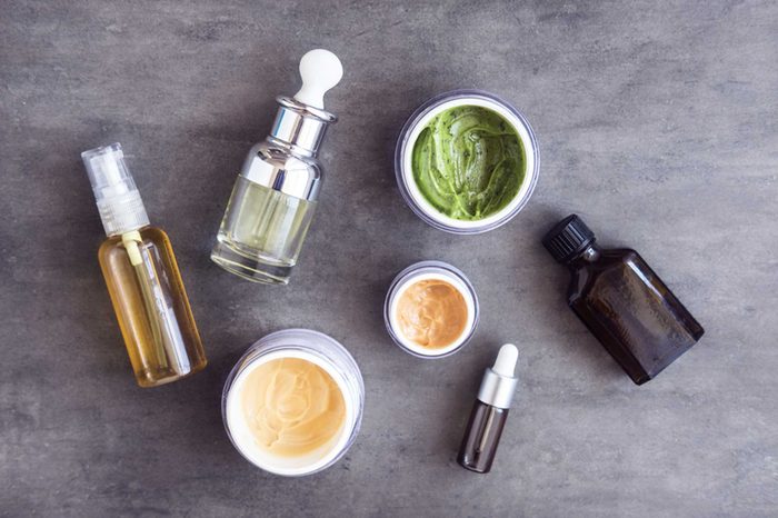 Natural acne-treating ingredients in jars and bottles.