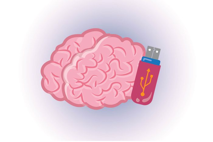Graphic of human brain with flash drive