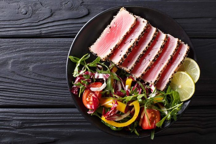 Tuna slices with salad