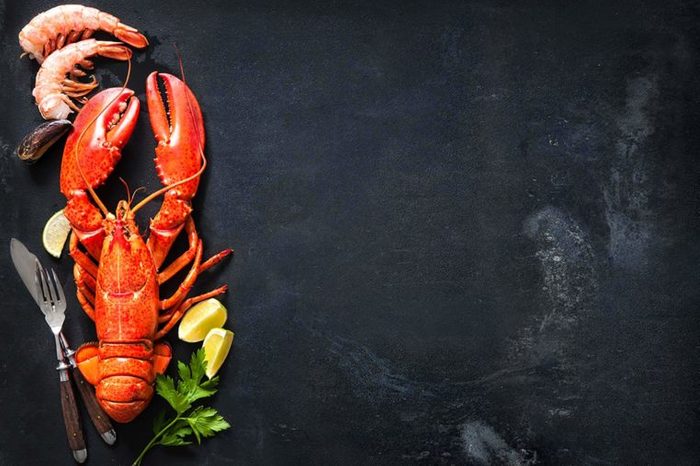 Lobster and shrimp and lemon wedges