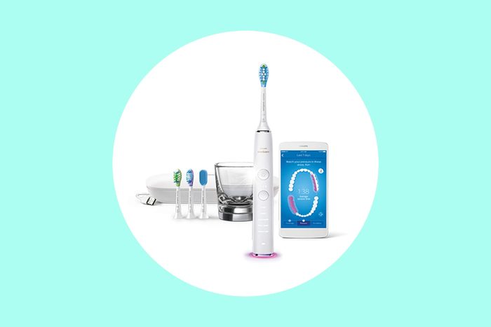 Philips Sonicare DiamondClean toothbrush with multiple brush heads.