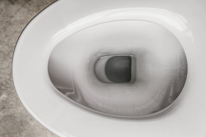 empty white toilet bowl