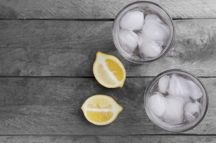 glasses of water with lemon slices