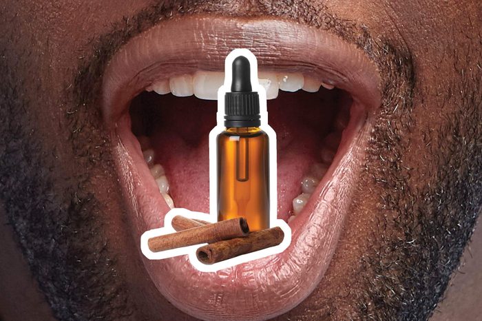 Cinnamon oil over an open mouth