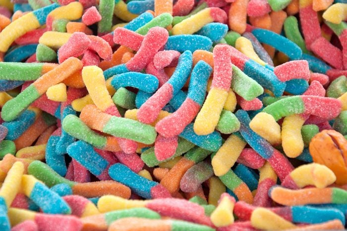 close up of rainbow-colored gummy worms