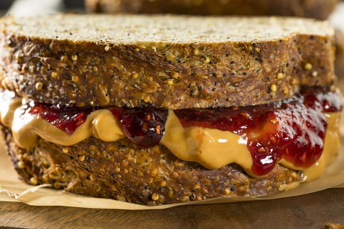 Peanut butter and jelly sandwich on wheat bread