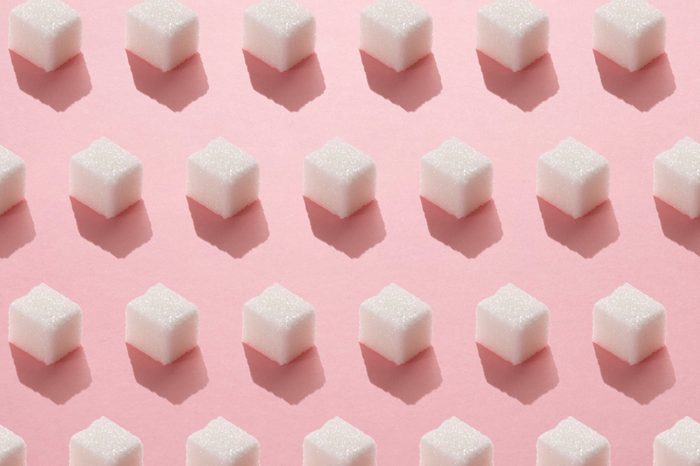 sugar cubes repeated on light pink background