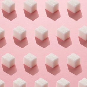 sugar cubes repeated on light pink background