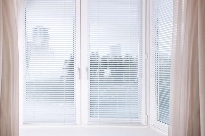 Horizontal image white Window with Venetian Blinds, Designer Blinds around the edges 