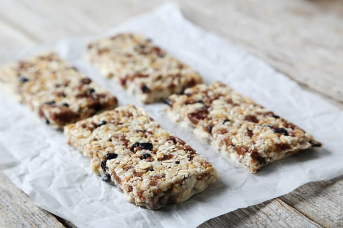 Granola bars on a grey wooden table