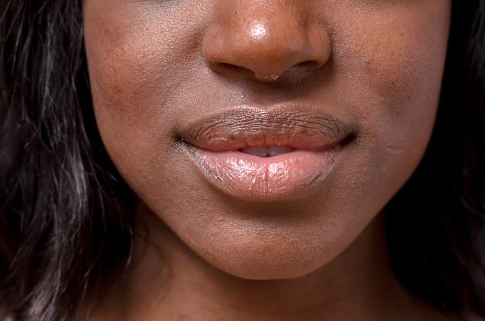 Close up Bare Lips and Nose of a young woman