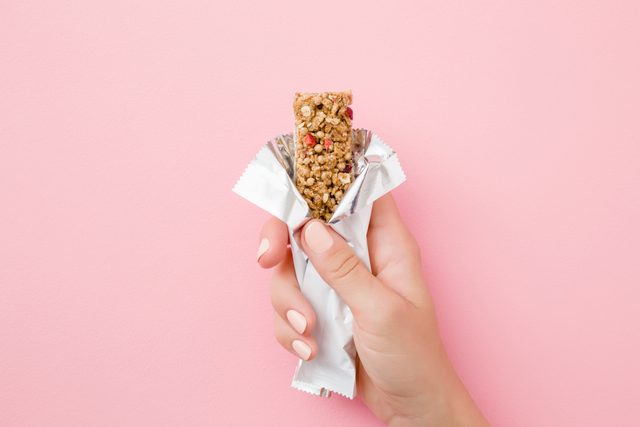 granola bar on pink background