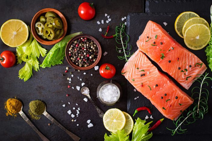Raw salmon fillet and ingredients.
