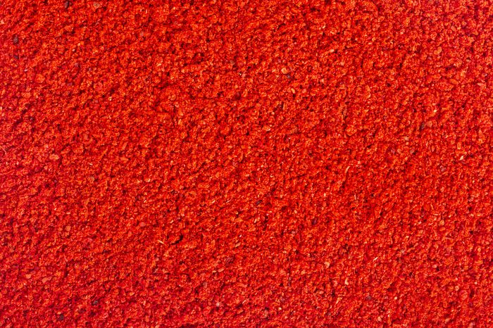 ground paprika background texture surface top view