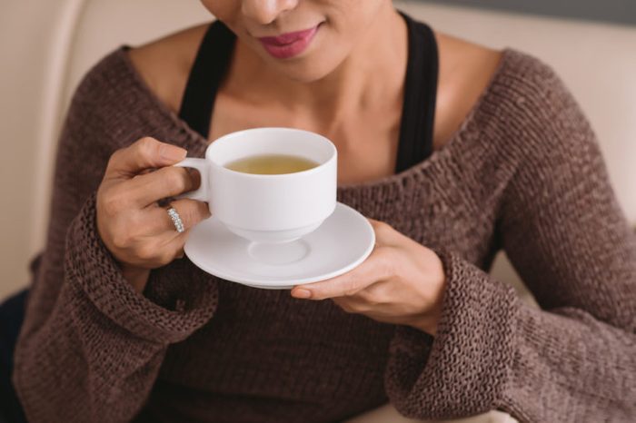 Woman drinking ginger tea
