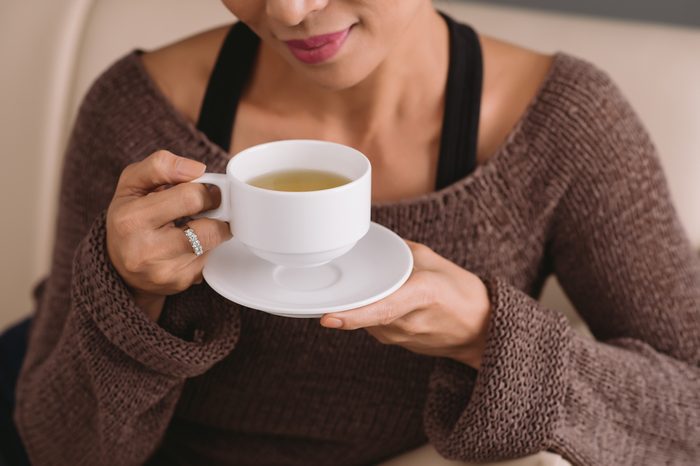 Woman drinking ginger tea