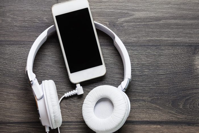White headphones and smart phone