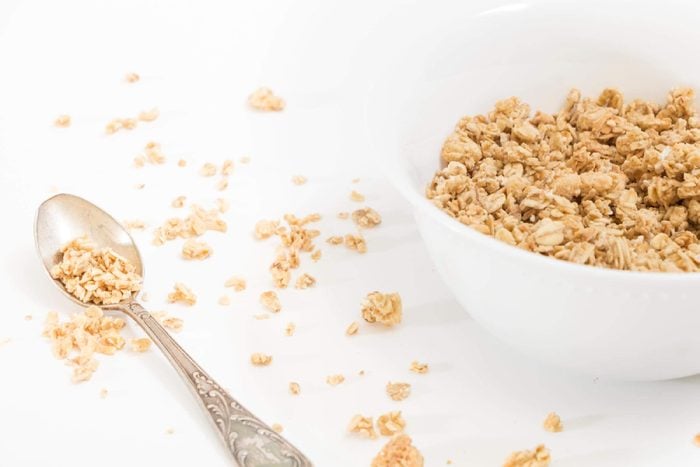 Bowl of granola and spoon