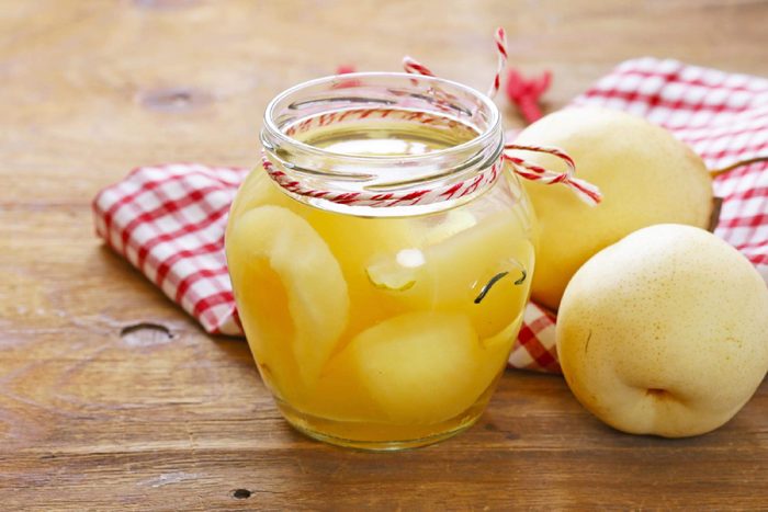 Canned fruit pears in a glass jar