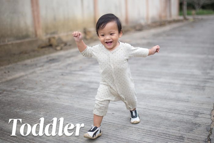 happy toddler running
