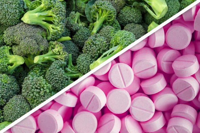 broccoli next to pink pills