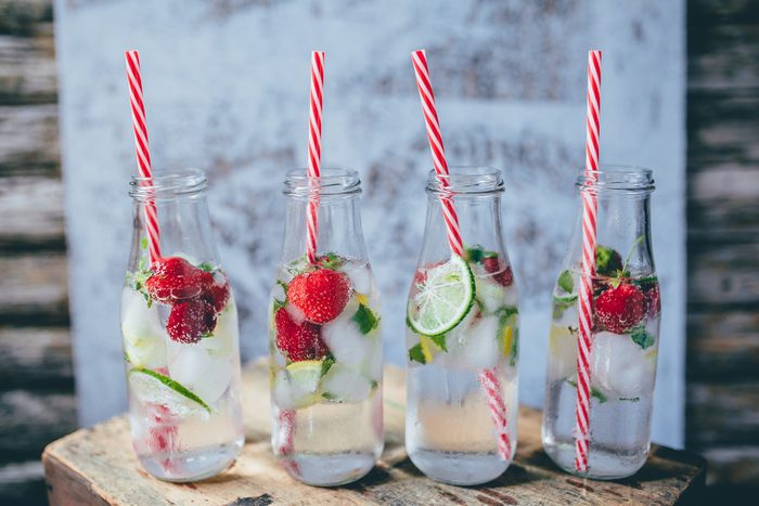 Refreshing infused water summer drinks with strawberries and lime