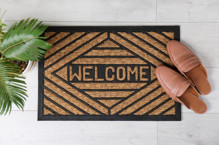 home welcome door mat with shoes