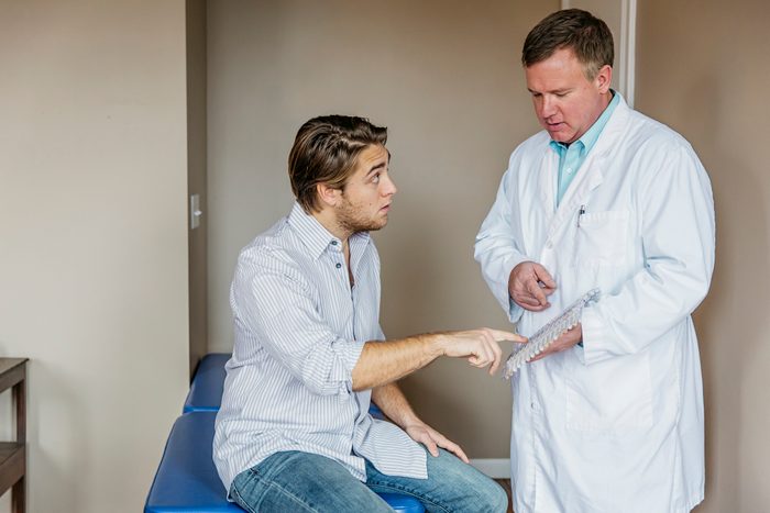 patient talking to chiropractor