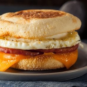 Homemade Breakfast Egg Sandwich with Cheese on an English Muffin