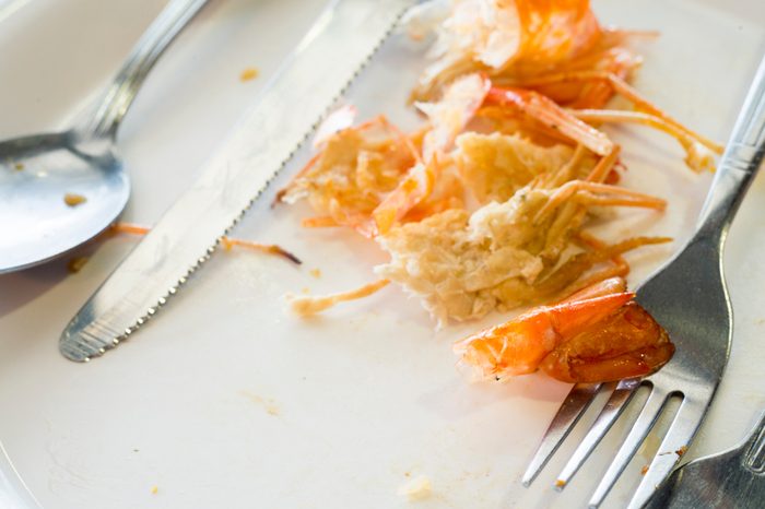 plate of scraps after eating shrimp