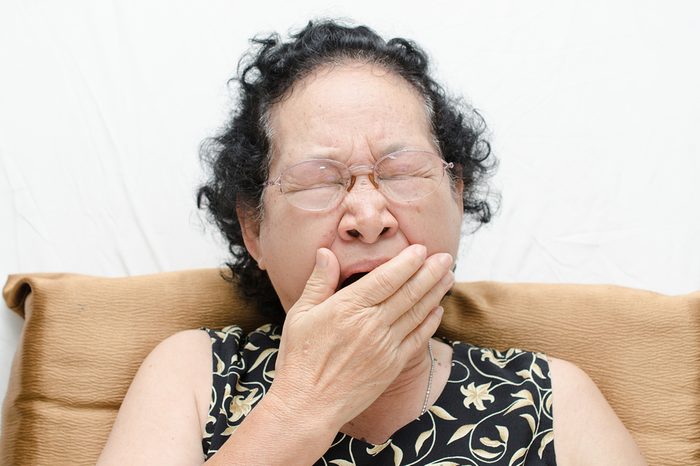 Portrait of emotion asian senior woman with yawn expression 