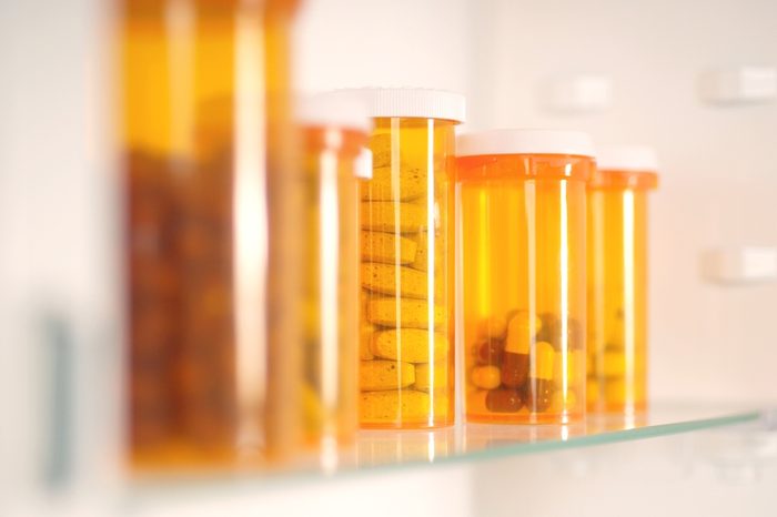 Bottles of pills in a medicine cabinet