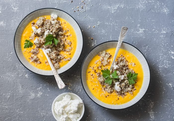 Pumpkin soup with quinoa and feta cheese