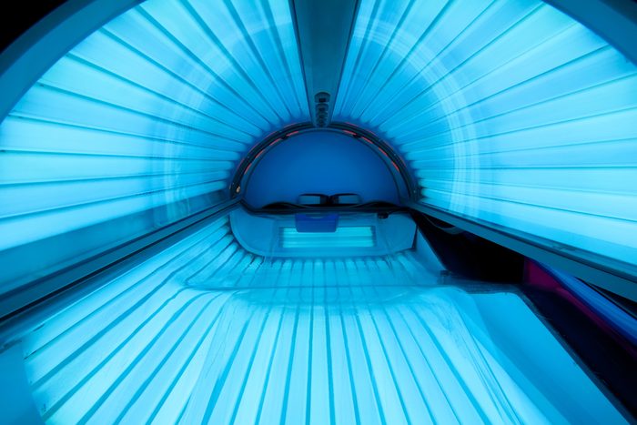Inside empty tanning bed.
