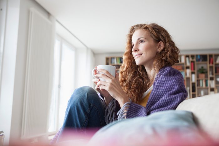 woman sitting at home relaxing