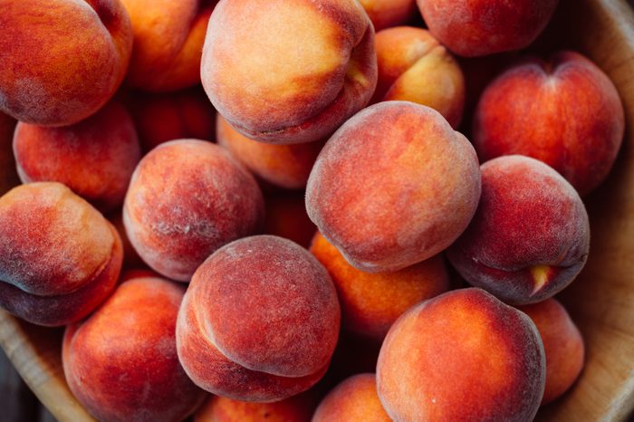 basket of ripe peaches
