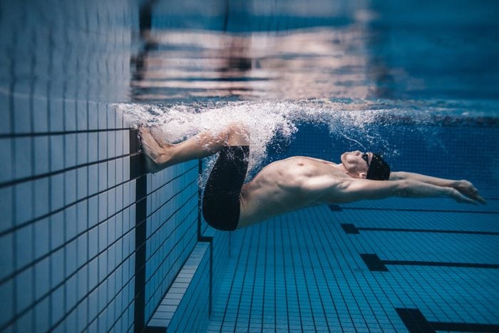 man swimming to keep brain healthy