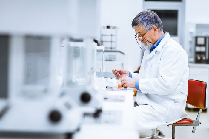 Male researcher carrying out scientific research in a lab