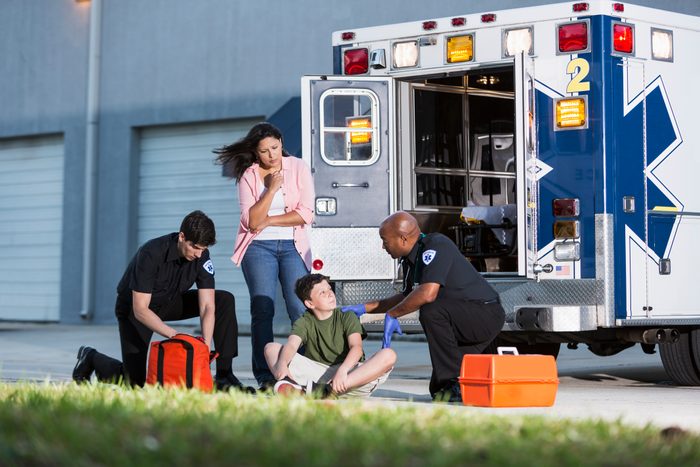 medical emergency with paramedics and ambulance