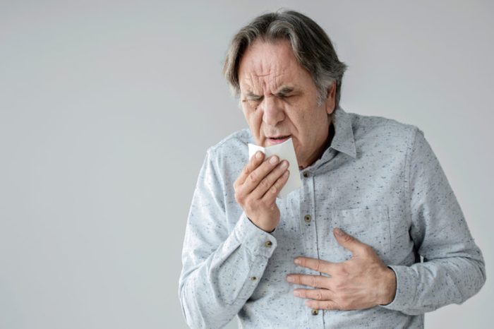 old man coughing