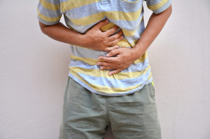 man with abdomen pain and bloating.