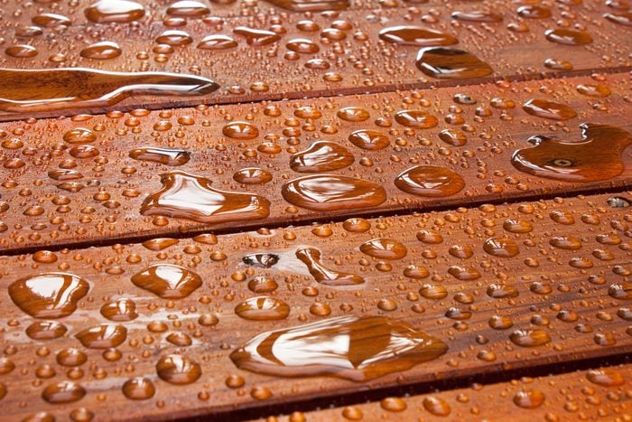 water droplets on wooden deck