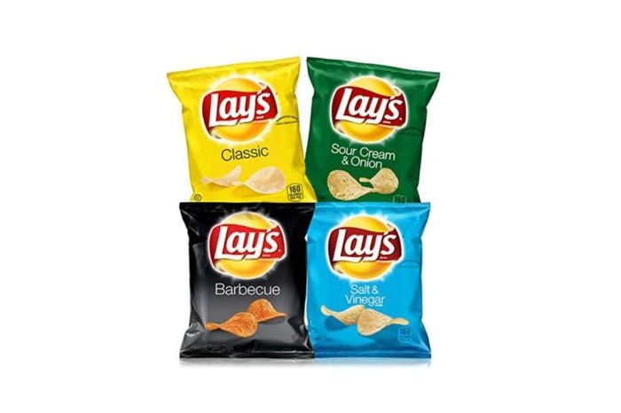 four bags of Lay's potato chips
